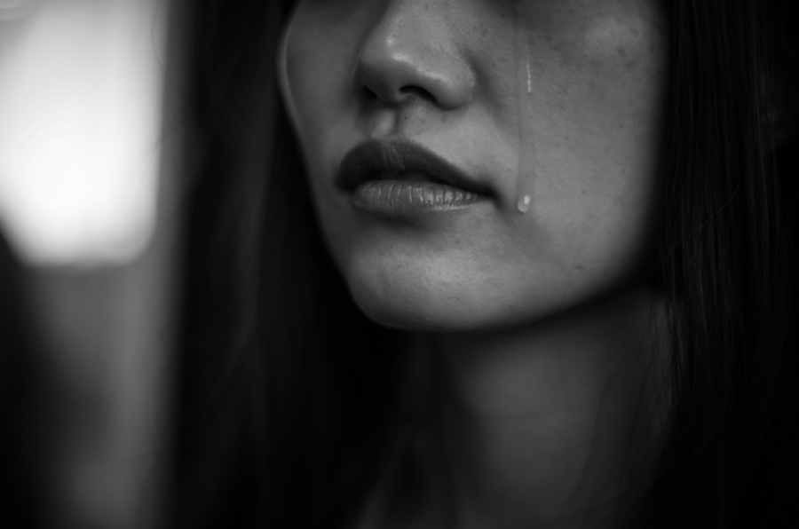 Woman shedding tears